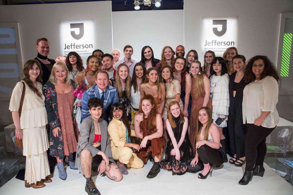 Jefferson fashion design faculty and students celebrate with Carson Kressley after the show.